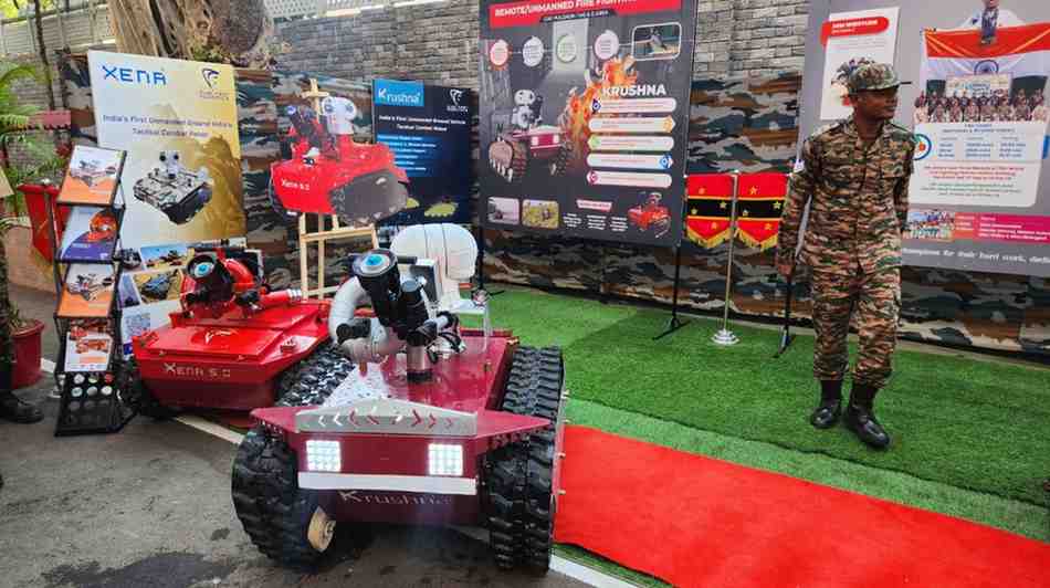 Xena with fire fighting with Krushna fire fighting  on presentation - Club First Robotics