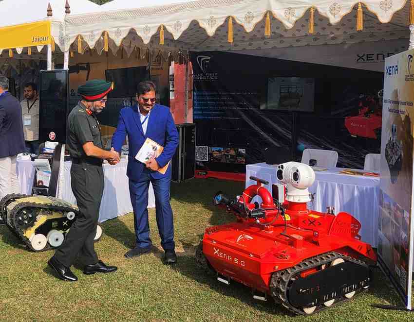 Xena fire fighting with Army Officer - Club First Robotics